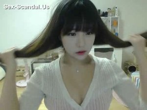 Pretty korean girl recording on camera